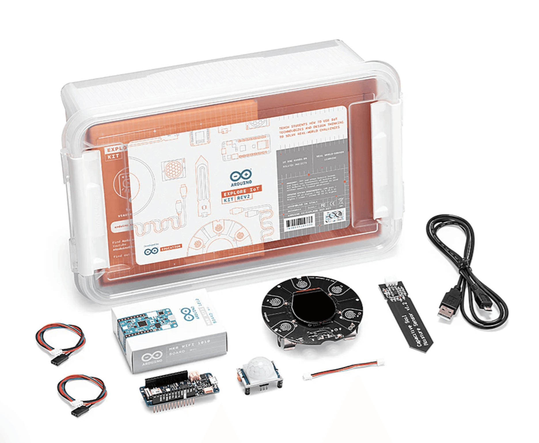 The full Explore IoT kit displayed on a table with extra sensors and its packaging