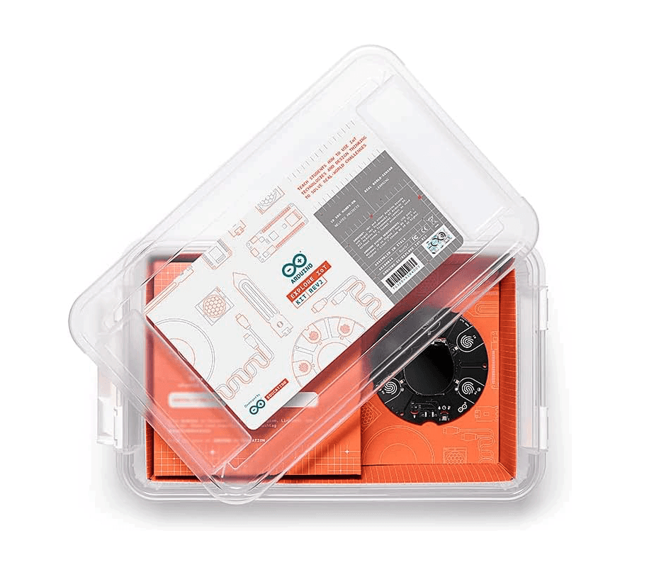 The Arduino Explore IoT kit in its transparent box packaging with orange fitting that has getting started instructions